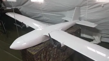 Ось-25-Р — той самий БпЛА в іншому ракурсі (двомоторний, два штовхальні гвинти)