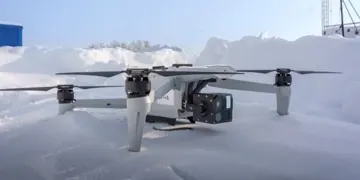 «Сибірячок-5» у польоті над засніженим полем